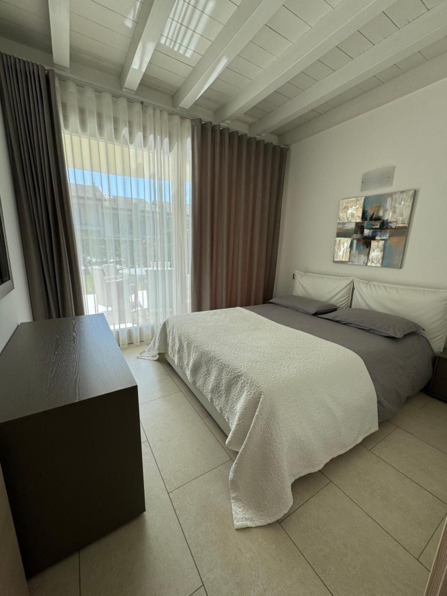 De Luxe Apartments Eden Сирмионе Экстерьер фото